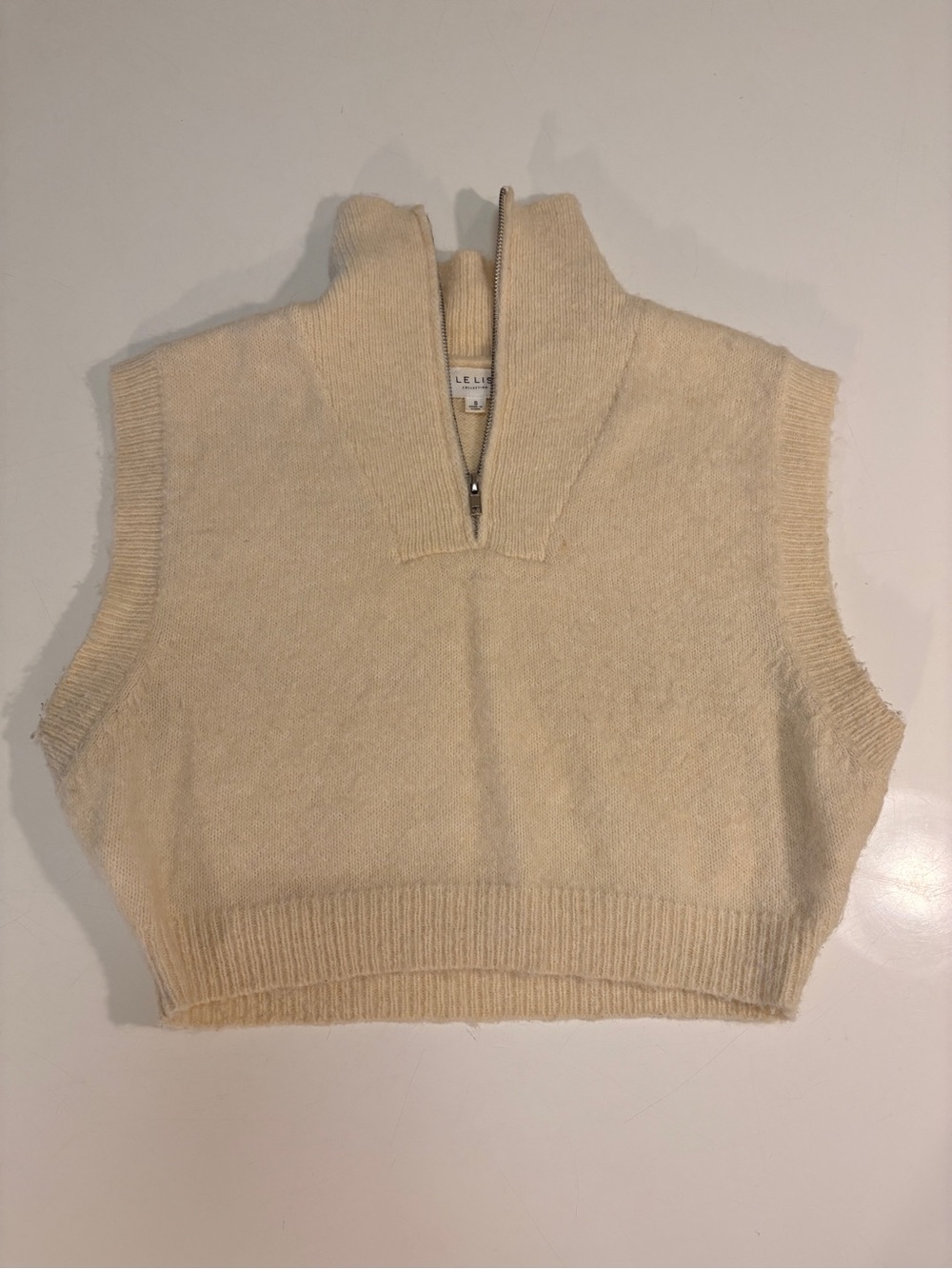 Le Lis Cream Cropped Sleeveless Half-Zip Turtleneck Sweater